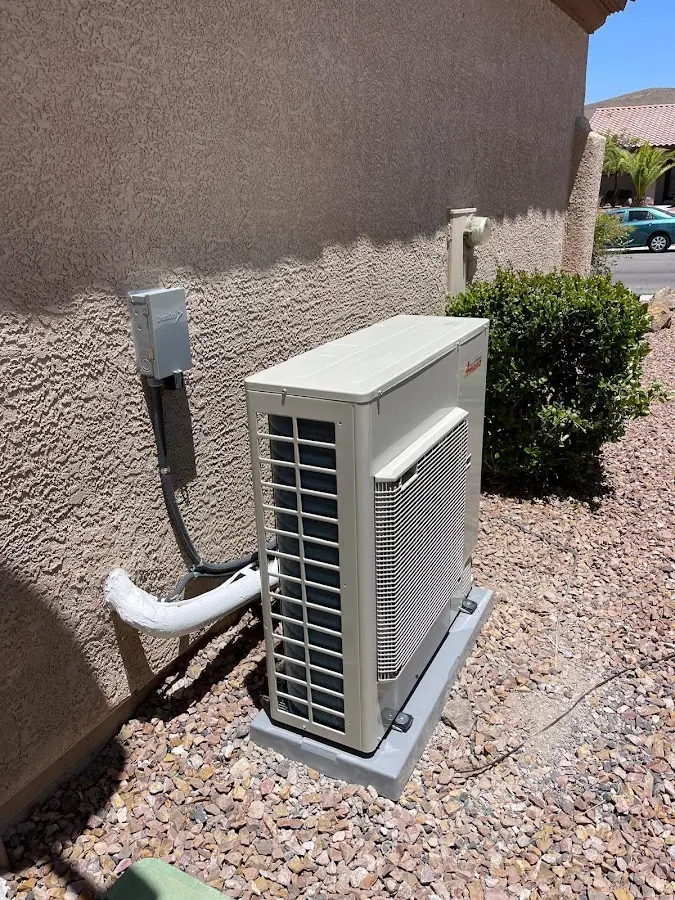 Residential air conditioning condenser unit in Redford